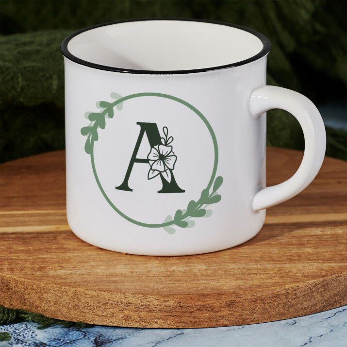 Monogram w kole kwiaty - Kubek ceramiczny z czarnym rantem Monogram w kole kwiaty - Kubek ceramiczny z czarnym rantem